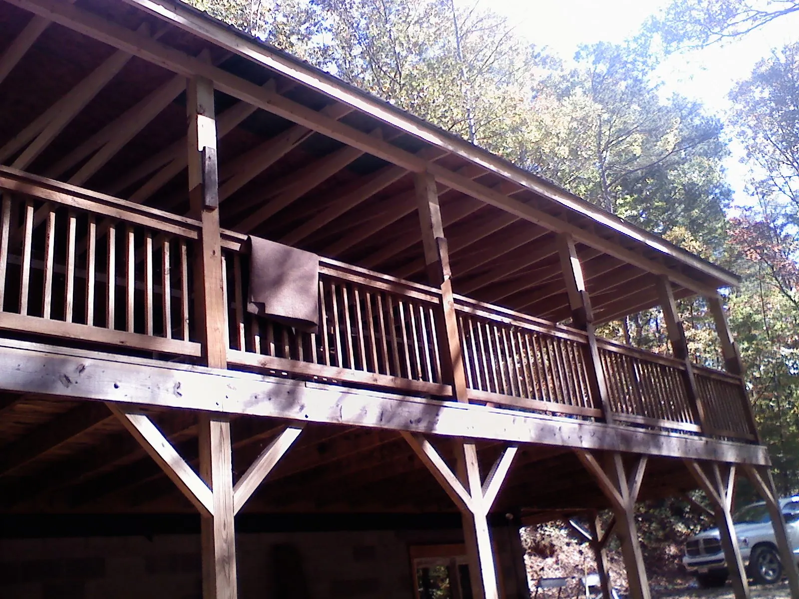 Timber framing under a new elevated porch and deck — Roof Leak Repair in Somersworth by Roofing Brothers